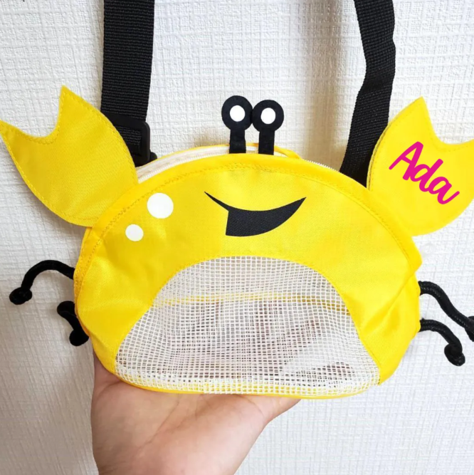 Bolsa de playa en forma de cangrejo para sujetar conchas, arena y juguetes