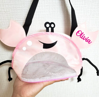 Bolsa de playa en forma de cangrejo para sujetar conchas, arena y juguetes