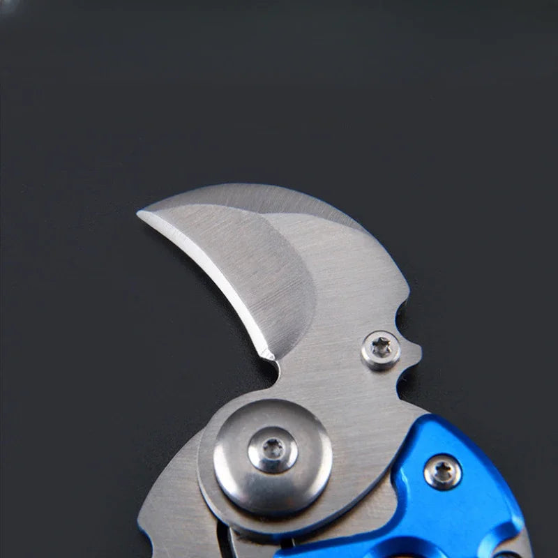 MINI LLAVERO NAVAJA CIRCULAR PLEGABLE