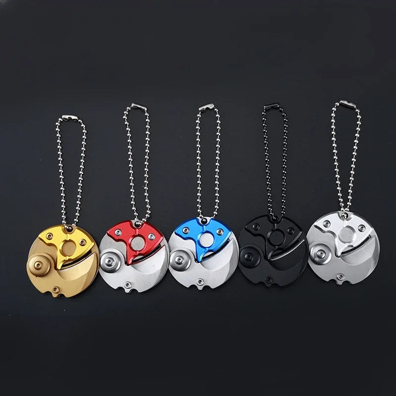 MINI LLAVERO NAVAJA CIRCULAR PLEGABLE