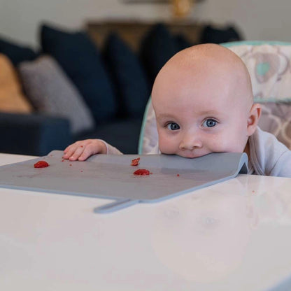 Mantel antiderrames protección de boquita de bebe